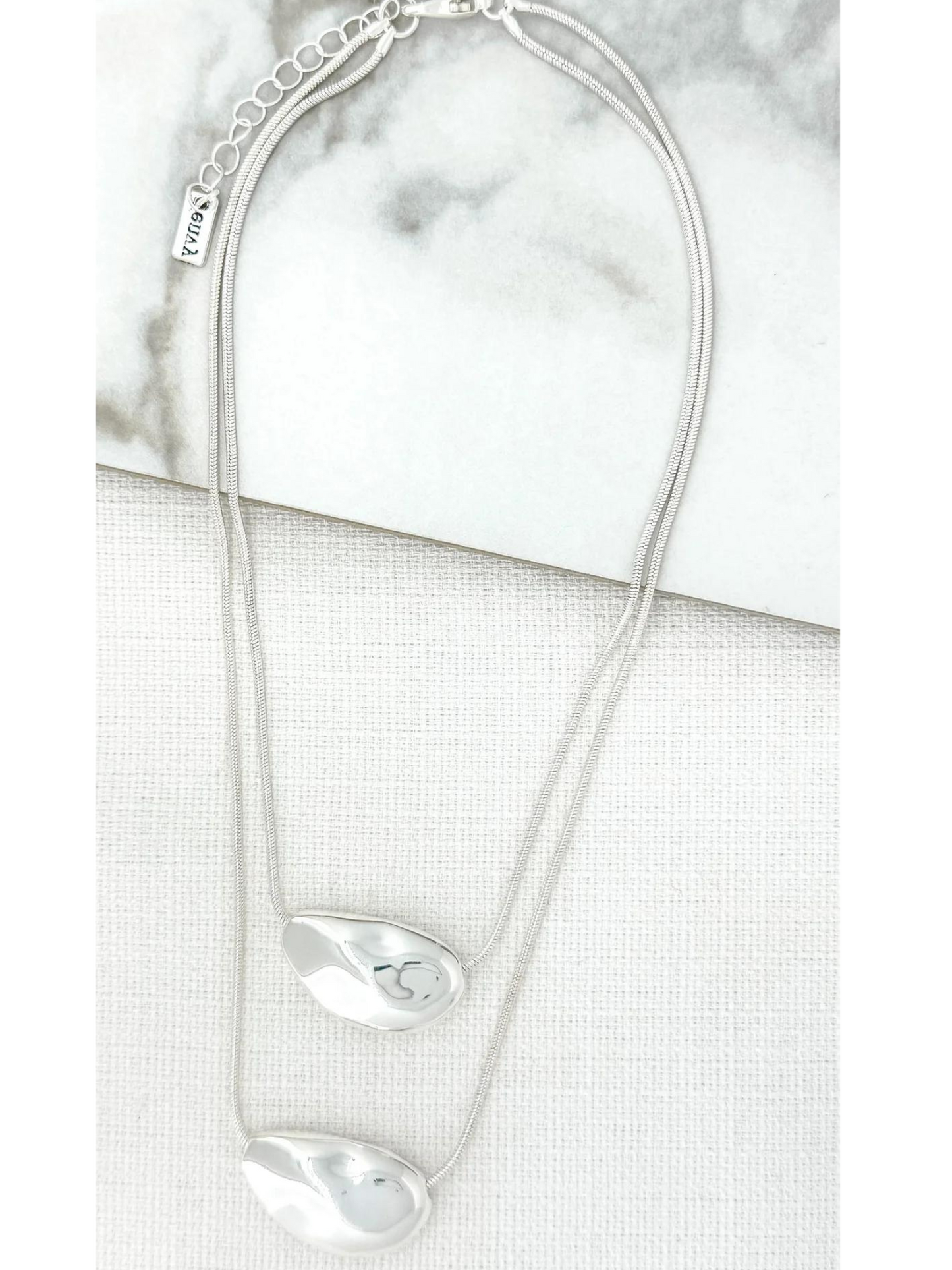 Envy silver double layer necklace with textured pebble pendants