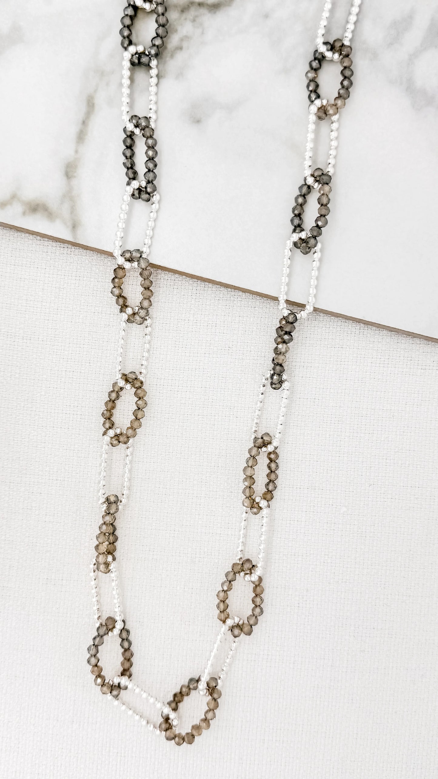 Envy long silver and grey beaded loops necklace