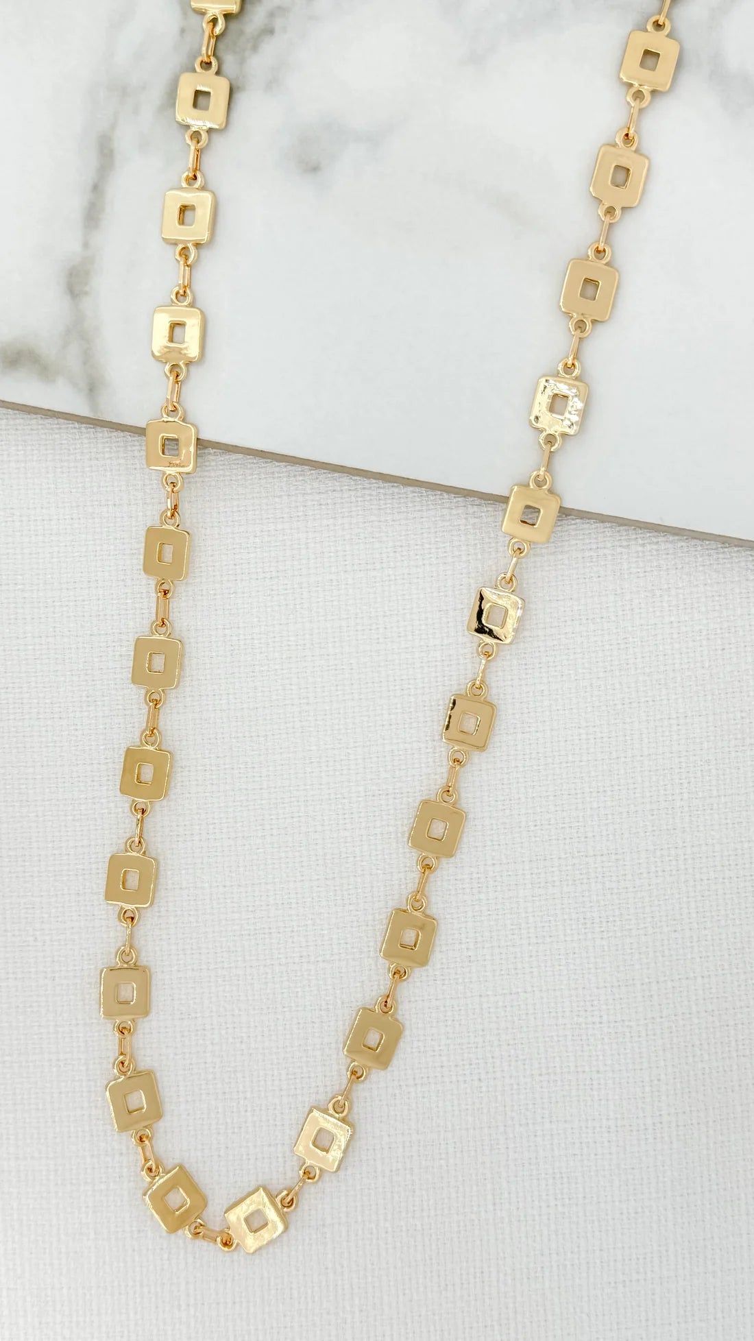 Envy long gold necklace with small square links