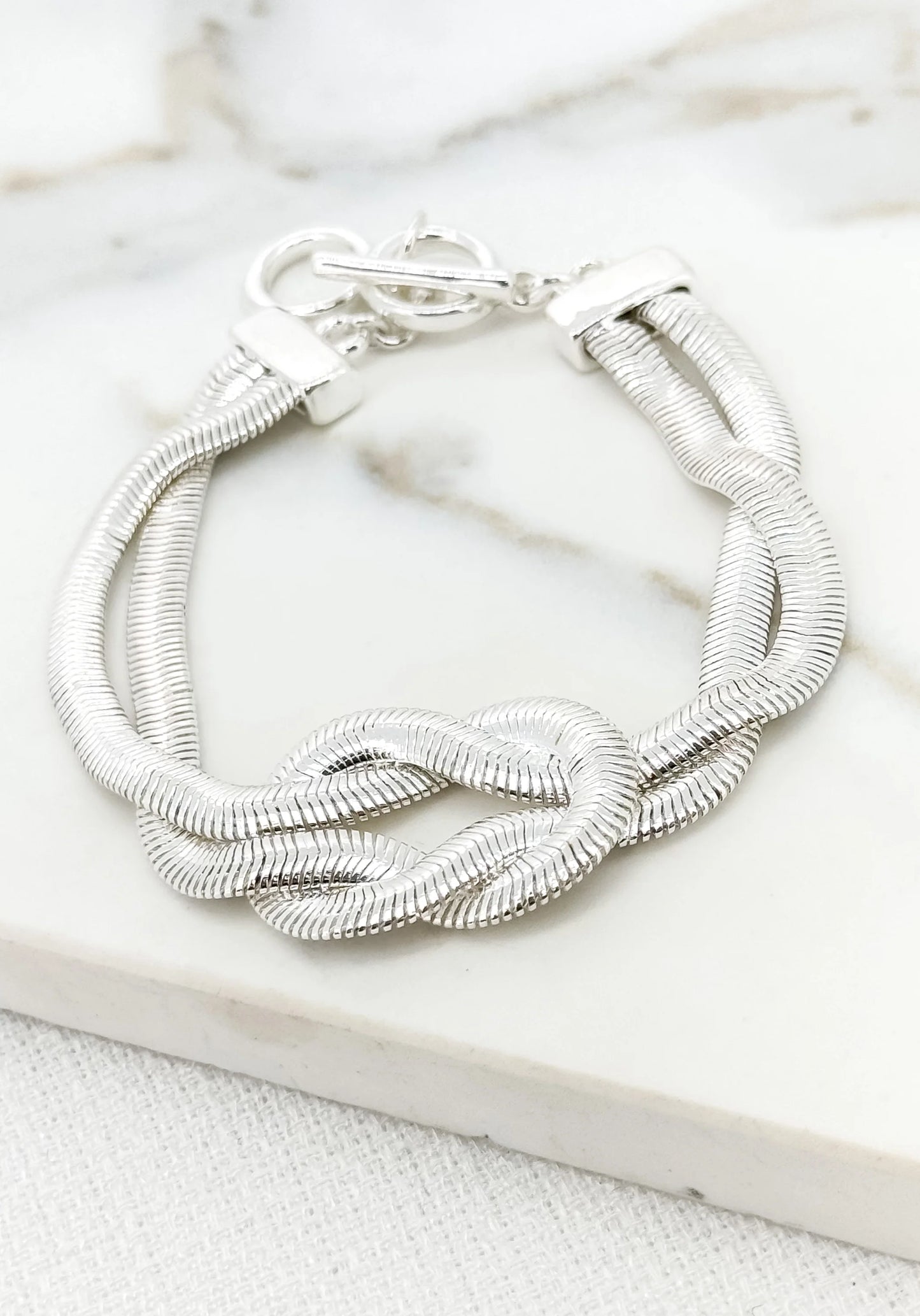 Silver snake chain T-bar bracelet with knot detail