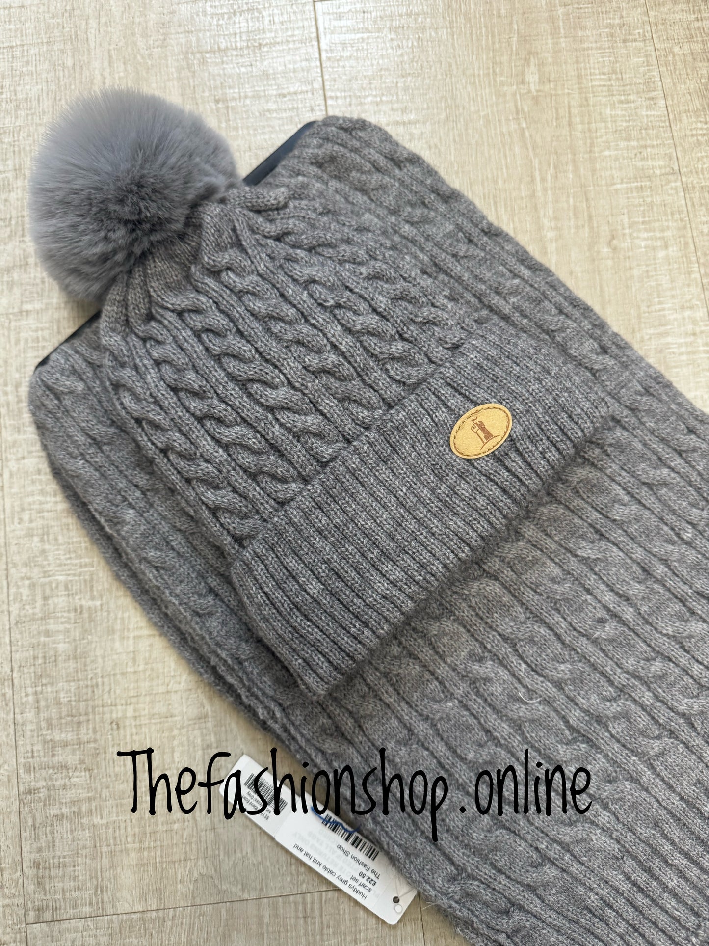 Huddy's grey cable knit hat and scarf set