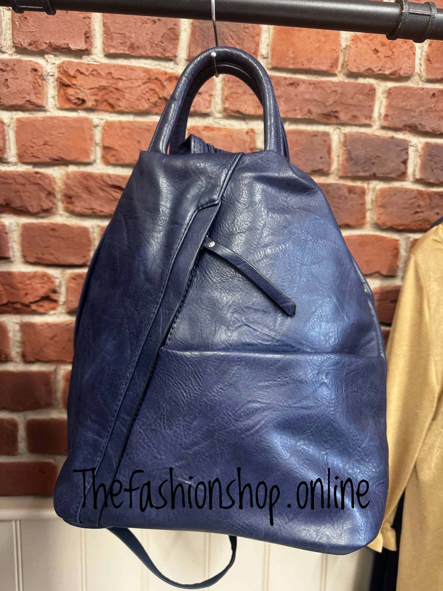 Navy vegan leather dual use backpack