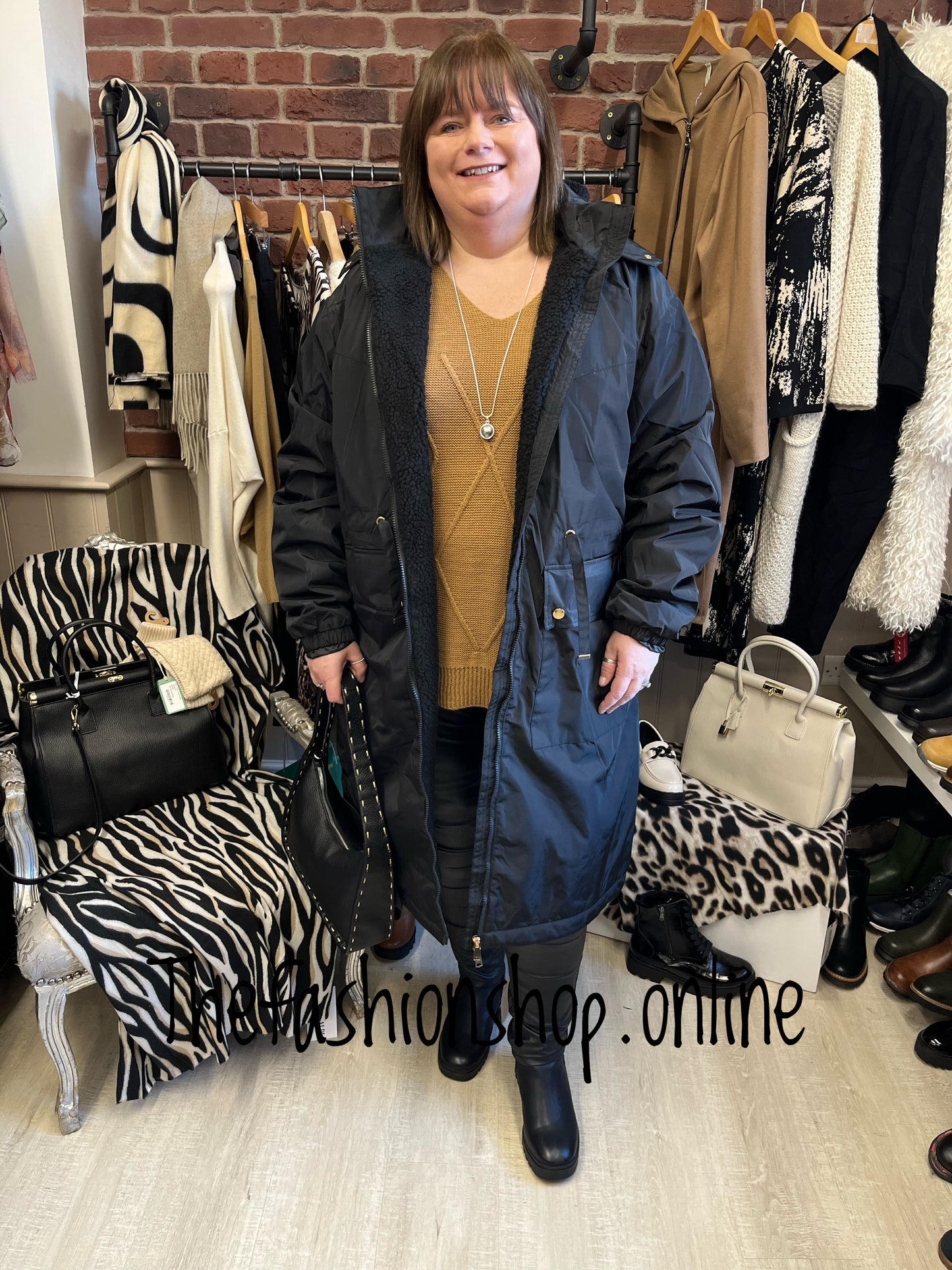 Black Sherpa lined parker coat sizes 10-20