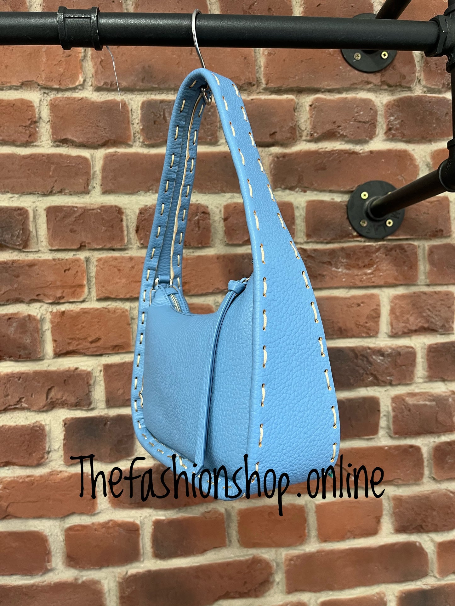 Small blue bag with stitch detail