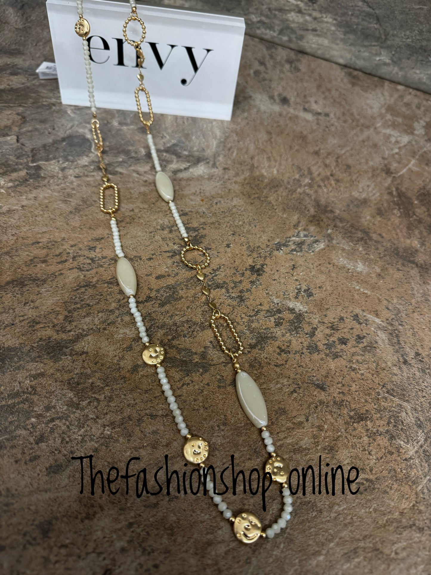 Envy gold and cream charm long necklace