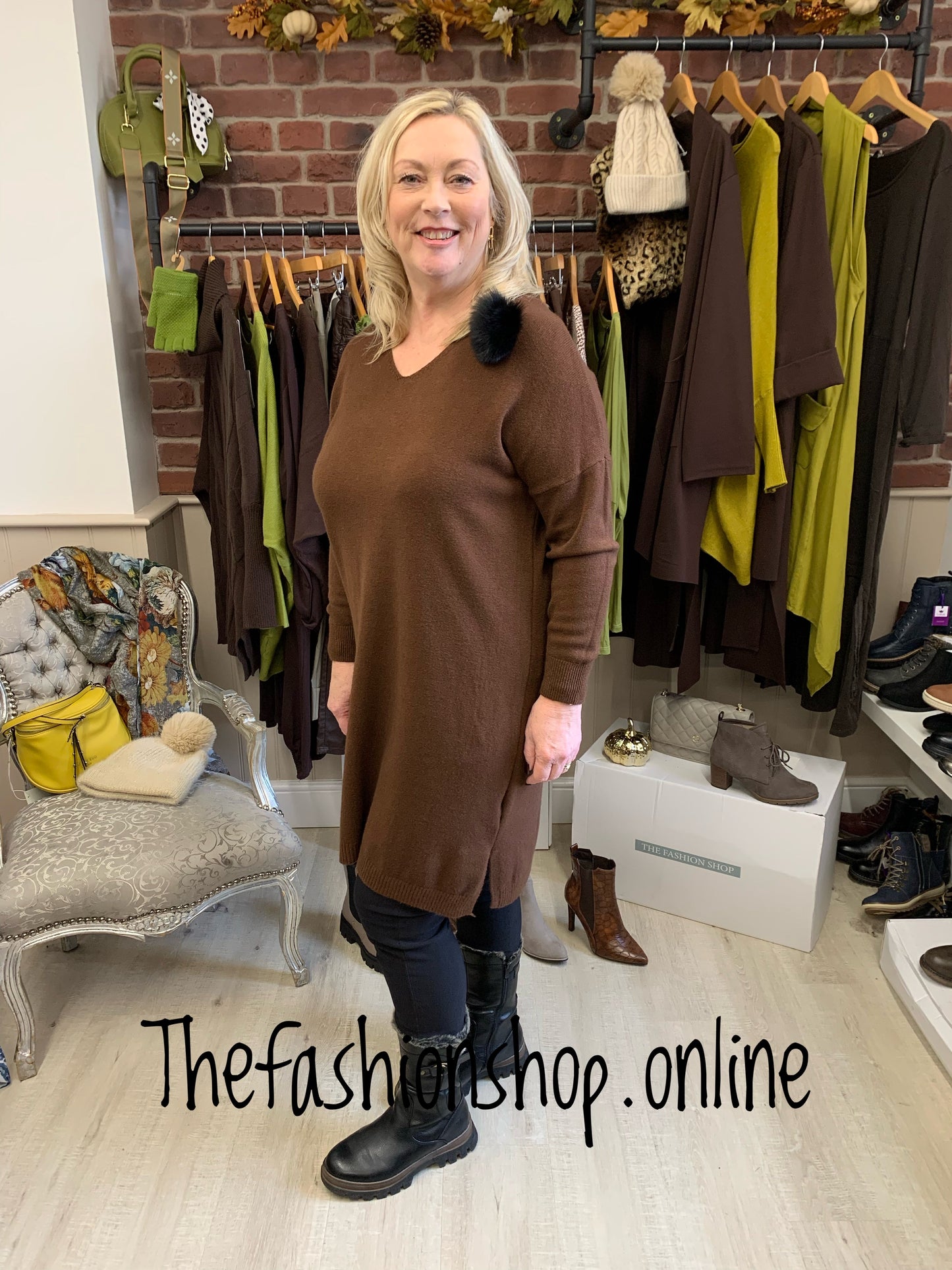 Brown jumper dress with pompom brooch 14-20